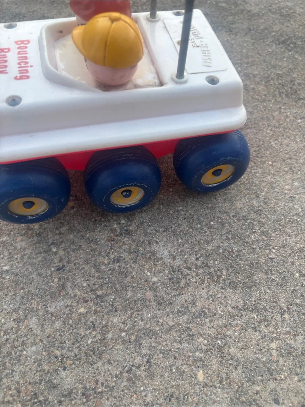 Vintage 1973 Fisher PriceBouncing Buggy Pull Toy - White with Blue & Red Accents
